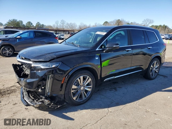 2021 Cadillac XT6 Premium Luxury z VIN 1GYKPCRS8MZ108761, wystawiony jako Copart lot #87185084 z przebiegiem 39 701 mil mil oraz Szkody całkowita. Historia ofert i sprzedaży dostępna na DreamBid. Obrazek 1.