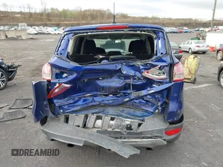 2015 Ford Escape SE with VIN 1FMCU9GX4FUC73125, listed as a IAAI auction lot 42071815 with 71,681 mi miles. Bid and sale history available at carsss.com. Image 16.