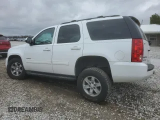 2012 GMC Yukon SLT with VIN 1GKS2CE09CR122728, listed as a Copart auction lot 87093604 with 124,739 mi miles and Salvage Title. Bid and sale history available at carsss.com. Image 2.