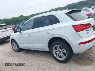 2019 Audi Q5 Premium with VIN WA1ANAFY1K2112834, listed as a IAAI auction lot 42443822 with 98,579 mi miles and . Bid and sale history available at DreamBid. Image 14.
