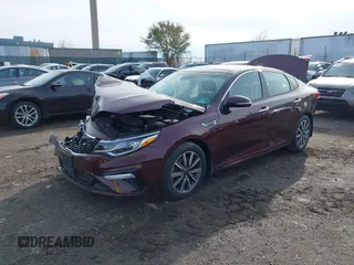 2019 Kia Optima EX with VIN 5XXGU4L11KG313557, listed as a IAAI auction lot 40973008 with 66,269 mi miles. Bid and sale history available at carsss.com. Image 17.