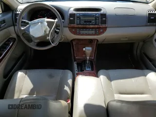 2005 Toyota Camry LE with VIN JTDBF32K750162268, listed as a Copart auction lot 53074715 with 230,037 mi miles and Salvage Title. Bid and sale history available at DreamBid. Image 8.