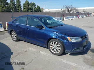 2014 Volkswagen Jetta SE z VIN 3VWD17AJ3EM321322, wystawiony jako IAAI lot #41831983 z przebiegiem 161 547 mil mil oraz . Historia ofert i sprzedaży dostępna na DreamBid. Obrazek 1.