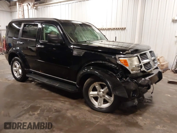 2007 Dodge Nitro SXT with VIN 1D8GU28K67W663621, listed as a IAAI auction lot 41691529 with 211,556 mi miles. Bid and sale history available at carsss.com. Image 1.