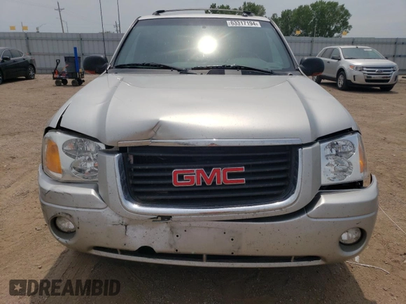 2004 GMC Envoy SLT with VIN 1GKDT13S842439635, listed as a Copart auction lot 63317194 with 201,672 mi miles and Salvage Title. Bid and sale history available at carsss.com. Image 5.
