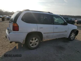 2006 GMC Envoy SLT with VIN 1GKDS13S962230376, listed as a Copart auction lot 43613965 with 136,462 mi miles and Salvage Title. Bid and sale history available at carsss.com. Image 3.