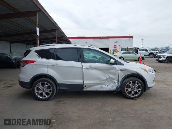 2013 Ford Escape SEL with VIN 1FMCU0H99DUB83641, listed as a IAAI auction lot 41578882 with 124,872 mi miles. Bid and sale history available at carsss.com. Image 13.