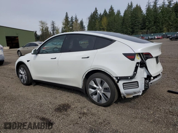 2023 Tesla Model Y Long Range with VIN 7SAYGDEE6PA101291, listed as a Copart auction lot 52758115 with 7,250 mi miles and Salvage Title. Bid and sale history available at DreamBid. Image 2.