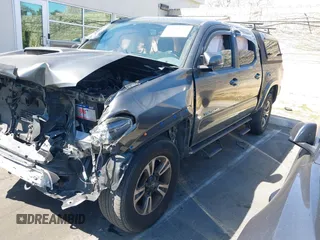 2017 Toyota Tacoma SR5 with VIN 3TMCZ5AN8HM102763, listed as a IAAI auction lot 41781283 with 38,734 mi miles and . Bid and sale history available at carsss.com. Image 2.