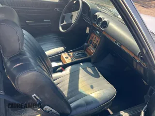 1984 Mercedes-Benz SL with VIN WDB1070421A009542, listed as a Copart auction lot 65327125 with 142,656 mi miles and Clean title. Bid and sale history available at DreamBid. Image 5.