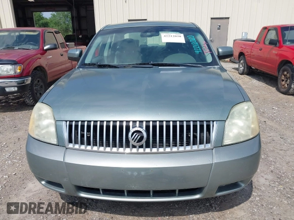 2006 Mercury Montego Luxury z VIN 1MEFM40106G609778, wystawiony jako IAAI lot #42212020 z przebiegiem Nie podano mil oraz . Historia ofert i sprzedaży dostępna na DreamBid. Obrazek 6.