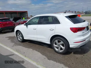 2021 Audi Q3 Premium with VIN WA1AUCF33M1096437, listed as a IAAI auction lot 41910411 with 86,837 mi miles and . Bid and sale history available at DreamBid. Image 15.