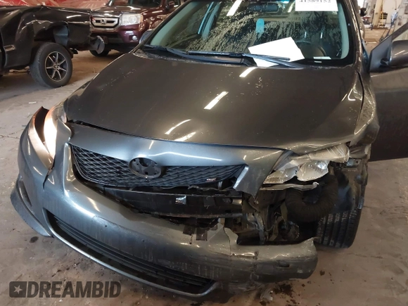 2010 Toyota Corolla with VIN 2T1BU4EE8AC510757, listed as a IAAI auction lot 41589152 with 164,857 mi miles. Bid and sale history available at carsss.com. Image 6.