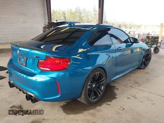 2018 BMW M2 z VIN WBS1J5C59JVA12718, wystawiony jako IAAI lot #41796602 z przebiegiem 53 707 mil mil oraz . Historia ofert i sprzedaży dostępna na DreamBid. Obrazek 4.