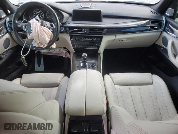 2017 BMW X5 xDrive50i with VIN 5UXKR6C54H0J84099, listed as a Copart auction lot 76269094 with 68,026 mi miles and Salvage title. Bid and sale history available at DreamBid. Image 8.