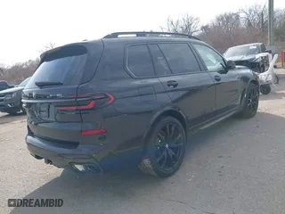 2025 BMW X7 xDrive40i with VIN 5UX23EM04S9X31373, listed as a IAAI auction lot 41429790 with 1,880 mi miles. Bid and sale history available at carsss.com. Image 4.