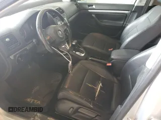 2010 Volkswagen Jetta SEL z VIN 3VWRX7AJ4AM100858, wystawiony jako Copart lot #60695995 z przebiegiem 158 477 mil mil oraz Szkoda całkowita • Salvage title. Historia ofert i sprzedaży dostępna na DreamBid. Obrazek 7.