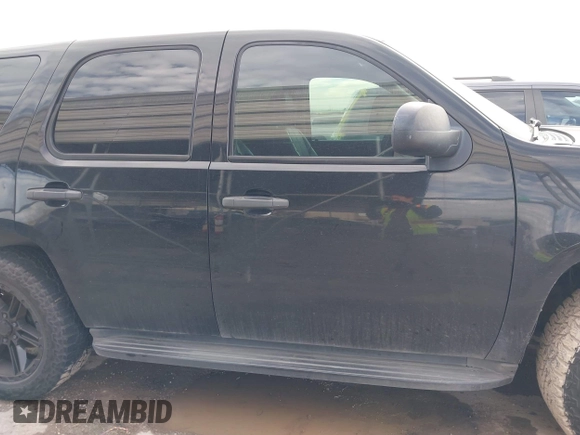 2011 Chevrolet Tahoe Commercial with VIN 1GNLC2E00BR325388, listed as a IAAI auction lot 41472731 with 265,781 mi miles and . Bid and sale history available at DreamBid. Image 14.