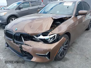 2019 BMW 3 Series 330i with VIN WBA5R1C57KAK07519, listed as a IAAI auction lot 42042379 with 40,898 mi miles and . Bid and sale history available at DreamBid. Image 6.