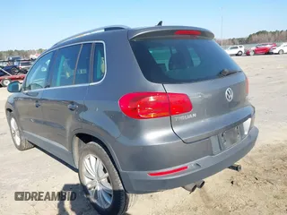 2012 Volkswagen Tiguan SE with VIN WVGAV7AX5CW000275, listed as a IAAI auction lot 41789246 with 123,618 mi miles and . Bid and sale history available at DreamBid. Image 3.