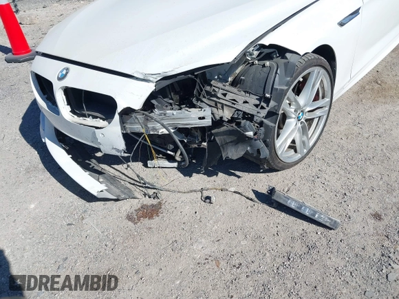 2015 BMW 6 Series 640i with VIN WBA6A0C54FGB53785, listed as a IAAI auction lot 40612020 with 67,524 mi miles and . Bid and sale history available at DreamBid. Image 6.