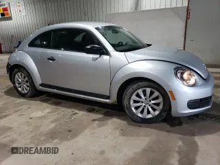 2016 Volkswagen Beetle Wolfsburg Edition with VIN 3VWF17AT3GM602307, listed as a Copart auction lot 56144965 with 63,317 mi miles and Salvage Title. Bid and sale history available at DreamBid. Image 4.