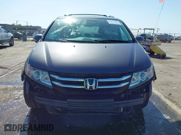 2015 Honda Odyssey Touring Elite с VIN 5FNRL5H93FB056183, выставлен на аукционе IAAI как лот 42073205 с пробегом 119 874 миль миль и . История ставок и продаж доступна на DreamBid. Изображение 13.
