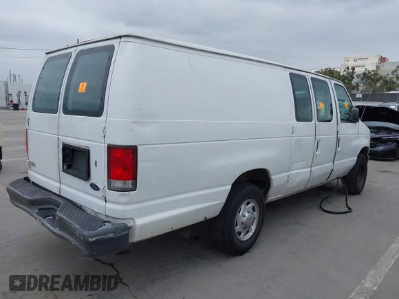 1999 Ford Econoline Cargo with VIN 1FTNS24L4XHB26129, listed as a IAAI auction lot 42187130 with 339,289 mi miles and . Bid and sale history available at DreamBid. Image 4.