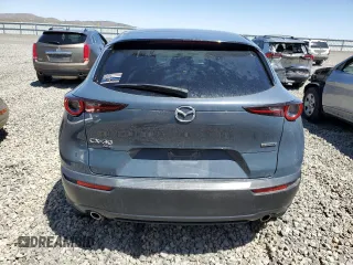 2023 Mazda CX-30 S Carbon Edition with VIN 3MVDMBCM1PM524019, listed as a Copart auction lot 57079355 with 46,737 mi miles and Salvage title. Bid and sale history available at DreamBid. Image 6.