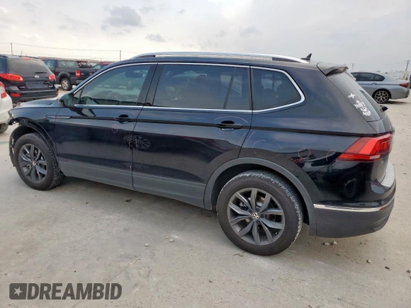 2023 Volkswagen Tiguan SE with VIN 3VVNB7AX2PM095304, listed as a Copart auction lot 56886785 with 29,894 mi miles and Salvage title. Bid and sale history available at DreamBid. Image 2.