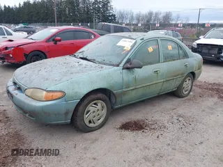 1998 Ford Escort SE z VIN 1FAFP13P5WW267120, wystawiony jako IAAI lot #41817184 z przebiegiem 167 299 mil mil oraz . Historia ofert i sprzedaży dostępna na DreamBid. Obrazek 2.