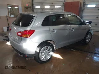 2015 Mitsubishi Outlander Sport ES with VIN 4A4AR3AU3FE039943, listed as a IAAI auction lot 41626095 with 142,610 mi miles. Bid and sale history available at carsss.com. Image 4.