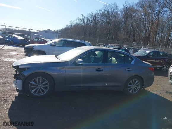 2015 Infiniti Q50 Premium with VIN JN1BV7AP4FM334762, listed as a IAAI auction lot 41443049 with 99,519 mi miles. Bid and sale history available at carsss.com. Image 15.