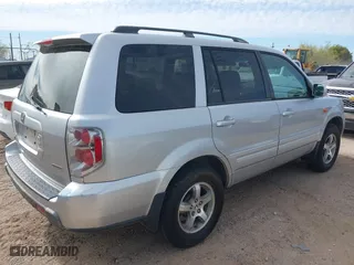 2006 Honda Pilot EX with VIN 2HKYF184X6H519132, listed as a IAAI auction lot 42030952 with 256,094 mi miles. Bid and sale history available at carsss.com. Image 4.