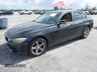 2013 BMW 3 Series 328i with VIN WBA3A5C5XDF359287, listed as a IAAI auction lot 42156728 with 152,333 mi miles and . Bid and sale history available at carsss.com. Image 2.