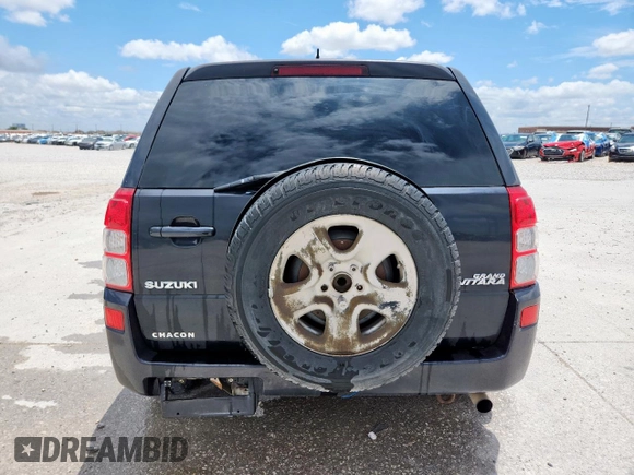 2008 Suzuki Grand Vitara with VIN JS3TE941284104419, listed as a Copart auction lot 63089375 with 216,057 mi miles and Salvage title. Bid and sale history available at DreamBid. Image 6.