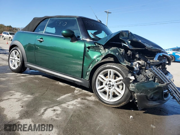 2015 MINI Convertible with VIN WMWZN3C53FT862148, listed as a Copart auction lot 76911714 with 56,065 mi miles and Salvage title. Bid and sale history available at DreamBid. Image 4.