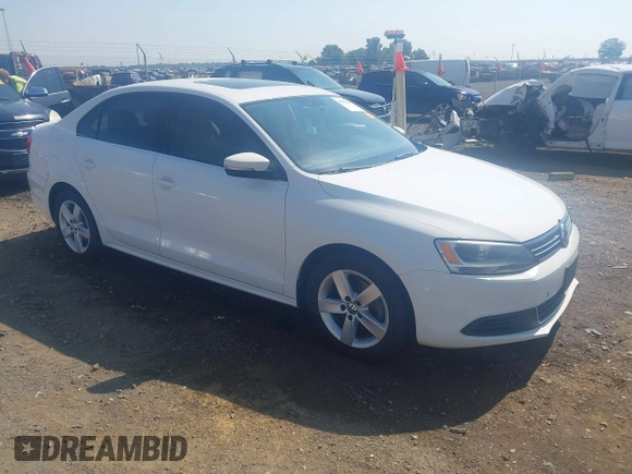 2014 Volkswagen Jetta TDI w/Premium/Nav with VIN 3VWLL7AJXEM366828, listed as a IAAI auction lot 42392563 with 132,924 mi miles and . Bid and sale history available at DreamBid. Image 1.