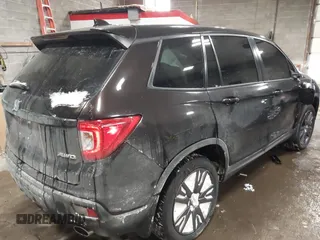 2020 Honda Passport EX-L with VIN 5FNYF8H53LB013931, listed as a IAAI auction lot 41614095 with 68,537 mi miles and . Bid and sale history available at DreamBid. Image 4.