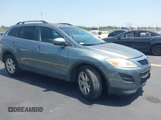 2012 Mazda CX-9 Sport with VIN JM3TB3BV2C0360495, listed as a IAAI auction lot 42284886 with 158,887 mi miles and . Bid and sale history available at DreamBid. Image 1.