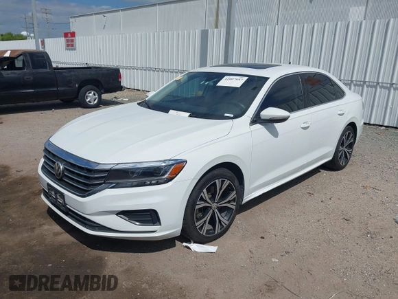 2021 Volkswagen Passat SE with VIN 1VWSA7A30MC000802, listed as a IAAI auction lot 42007087 with 190,171 mi miles and . Bid and sale history available at DreamBid. Image 2.