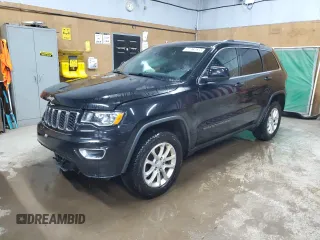 2021 Jeep Grand Cherokee Laredo E with VIN 1C4RJFAG4MC717010, listed as a Copart auction lot 56033035 with 75,054 mi miles and Salvage title. Bid and sale history available at DreamBid. Image 1.