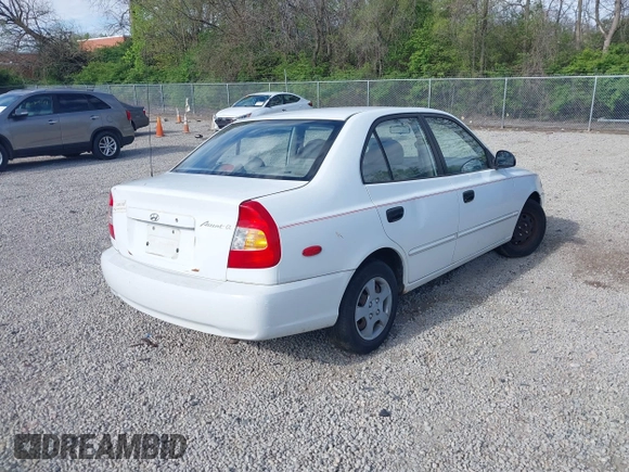 2002 Hyundai Accent GL with VIN KMHCG45C92U347708, listed as a IAAI auction lot 42137086 with 73,271 mi miles. Bid and sale history available at carsss.com. Image 4.