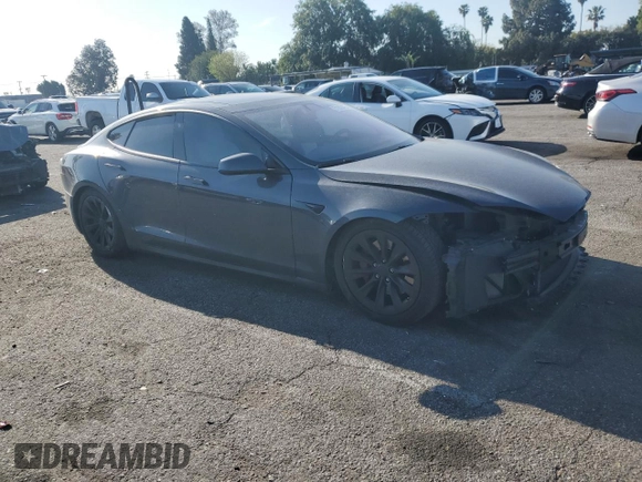 2017 Tesla Model S 100D с VIN 5YJSA1E23HF199497, выставлен на аукционе Copart как лот 51302475 с пробегом 61 993 миль миль и Списание • Salvage title. История ставок и продаж доступна на DreamBid. Изображение 4.