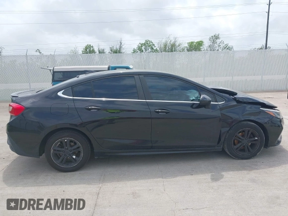 2017 Chevrolet Cruze LT with VIN 1G1BE5SM3H7201099, listed as a IAAI auction lot 41934728 with 141,369 mi miles and . Bid and sale history available at DreamBid. Image 13.