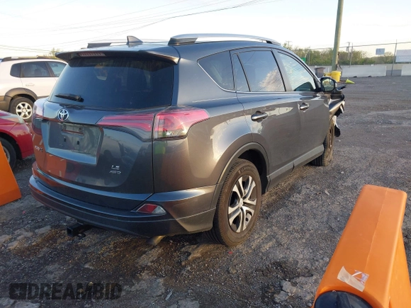 2016 Toyota RAV4 LE with VIN JTMBFREV1GD187414, listed as a IAAI auction lot 42033130 with 123,955 mi miles and . Bid and sale history available at carsss.com. Image 4.