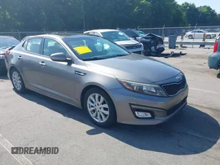 2015 Kia Optima EX with VIN 5XXGN4A78FG450859, listed as a IAAI auction lot 42519153 with 157,104 mi miles and . Bid and sale history available at DreamBid. Image 1.