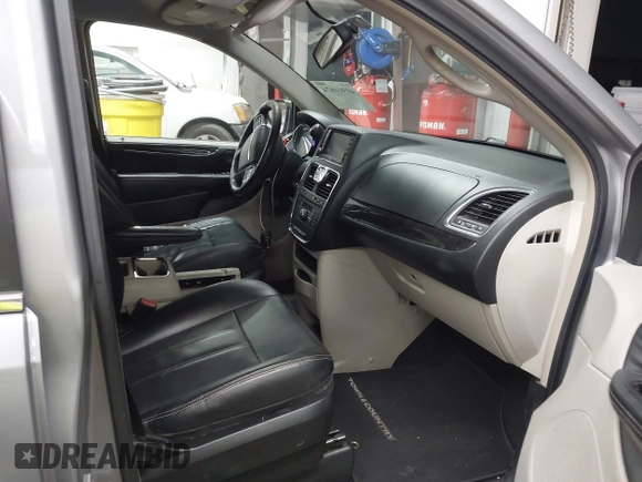2013 Chrysler Town & Country Touring with VIN 2C4RC1BG7DR730420, listed as a IAAI auction lot 41911674 with 179,810 mi miles and . Bid and sale history available at DreamBid. Image 5.