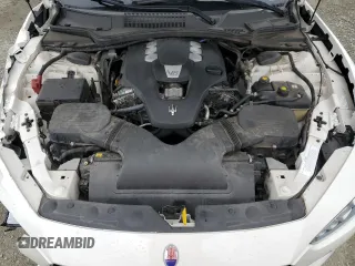 2018 Maserati Ghibli z VIN ZAM57XSA9J1271727, wystawiony jako Copart lot #52155305 z przebiegiem 62 081 mil mil oraz Szkoda całkowita • Salvage title. Historia ofert i sprzedaży dostępna na DreamBid. Obrazek 11.