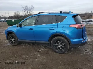 2017 Toyota RAV4 Hybrid SE with VIN JTMJJREV1HD120971, listed as a Copart auction lot 86187384 with 79,887 mi miles and Salvage Title. Bid and sale history available at carsss.com. Image 2.